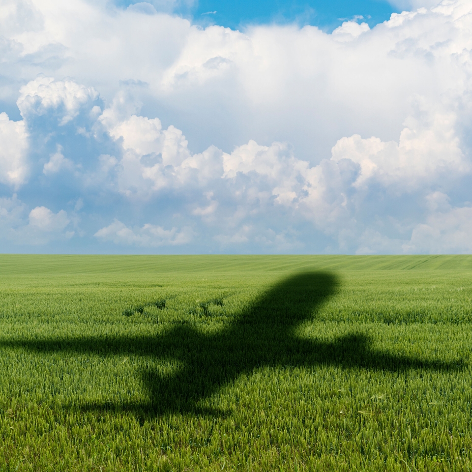 Shadow of plane on the agricultural field Shadow of plane on the agricultural field